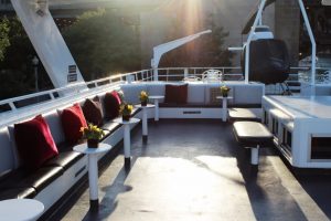 seating area with helicopter on anita dee yacht
