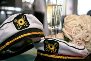 Captain's hats, roses and champagne on the Anita Dee private yacht charter in Chicago.