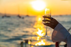 champagne toast at wedding anniversary on a yacht